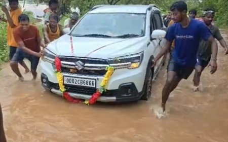 Car Swept Away in Floodwater in Udala